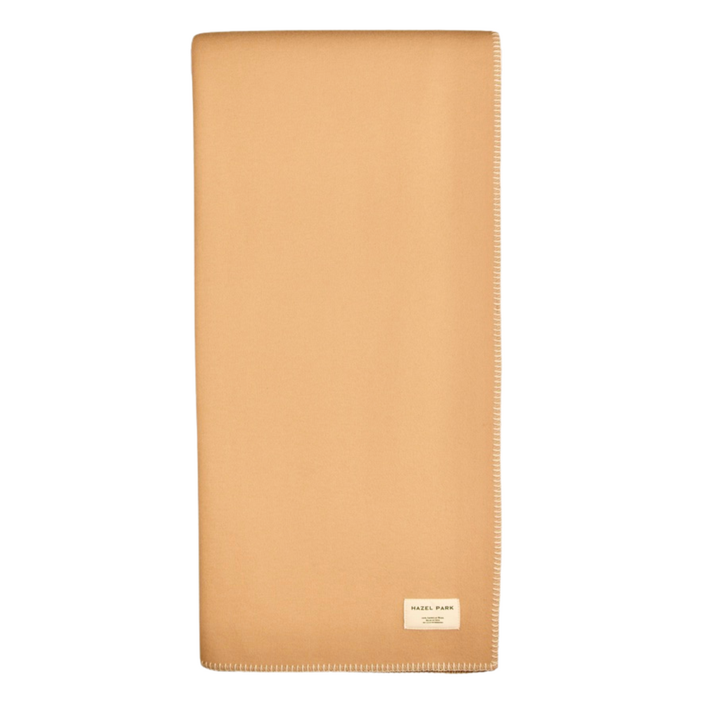 
                  
                    The Signature Wool Blanket
                  
                