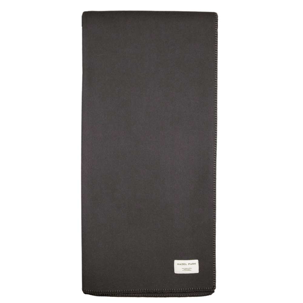 
                  
                    The Signature Wool Blanket
                  
                